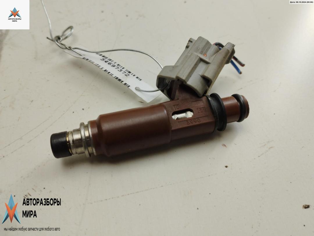 форсунка Suzuki Liana 1 поколение 2002, 1.6 л., бензин, МКПП, синий, хетчбэк 5 дв., 2213990 - фото №1