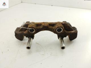 скоба суппорта Daewoo Lanos T100 1998, 1.6 л., бензин, МКПП, чёрный, хетчбэк 3 дв.