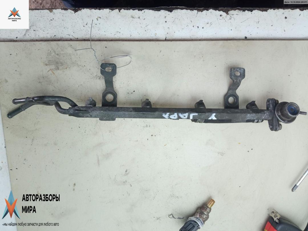 топливная рампа Mazda 323C BA 1996, 1.5 л., бензин, МКПП, серый, хетчбэк 3 дв. - фото №1