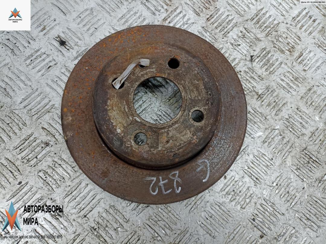 диск тормозной задний Opel Astra G 2001, 1.6 л., бензин, МКПП, серый, хетчбэк 5 дв. - фото №1