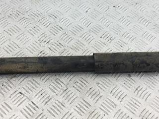 амортизатор задний левый Nissan Micra 3 поколение (K12) 2003, 1.0 л., бензин, МКПП, красный, хетчбэк 3 дв.