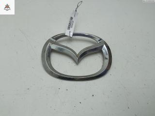 эмблема Mazda 6 GG [рестайлинг] 2006, 1.8 л., бензин, МКПП, серый, универсал, GJ6J-51730