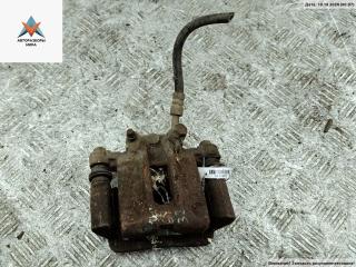 суппорт задний правый Toyota Corolla 9 поколение (E120/E130) 2002, 1.6 л., бензин, МКПП, чёрный, хетчбэк 3 дв.