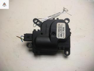 моторчик заслонки печки Ford Fiesta 6 поколение 2009, 1.3 л., бензин, МКПП, белый, хетчбэк 3 дв., 1S7H19B634CA