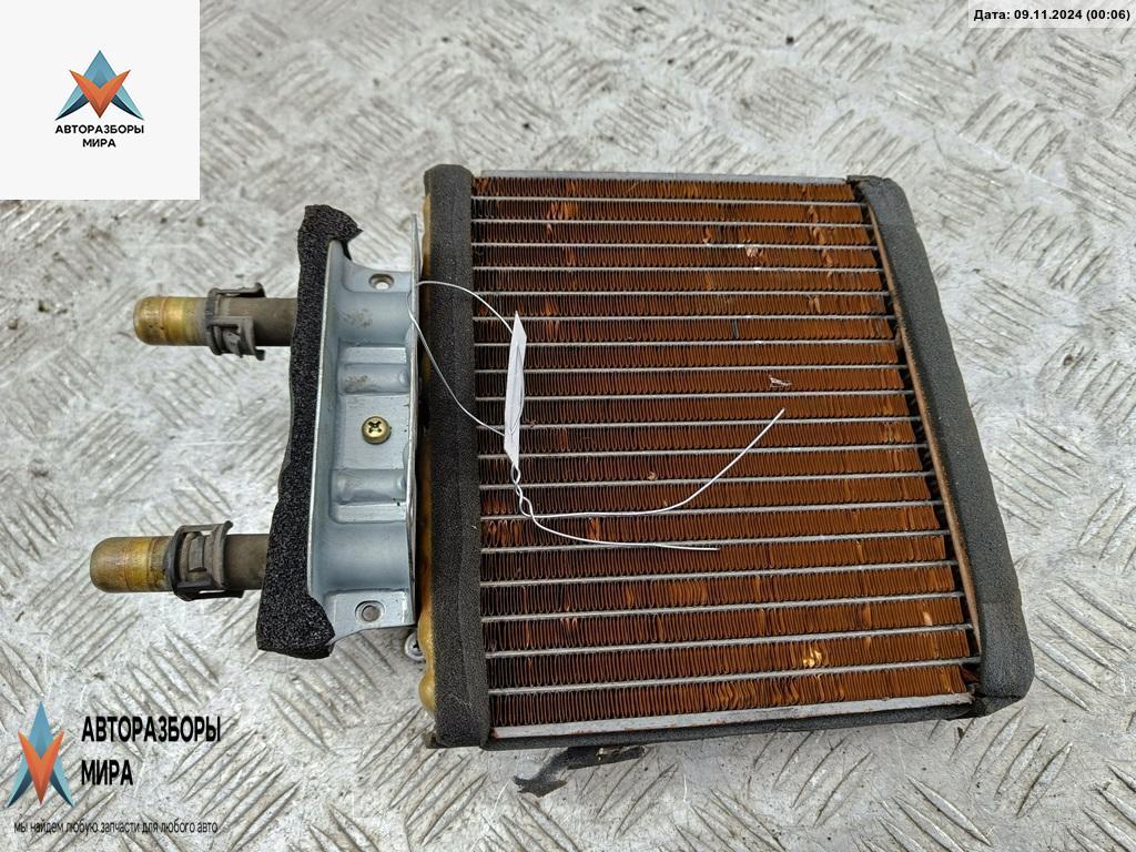радиатор отопителя (печки) Mazda MX-3 1 поколение 1997, 1.6 л., бензин, МКПП, серый, купе - фото №1
