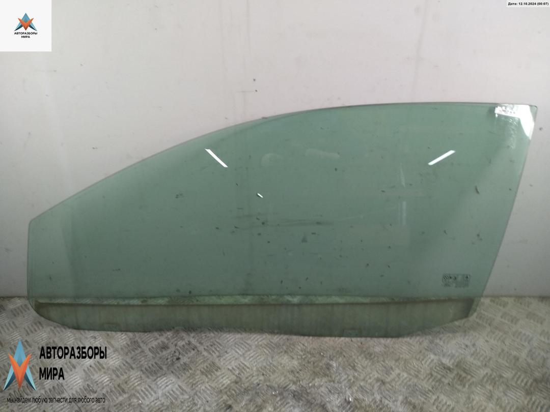 стекло двери передней левой Ford Focus 2 поколение 2005, 1.4 л., бензин, МКПП, синий, хетчбэк 3 дв. - фото №1