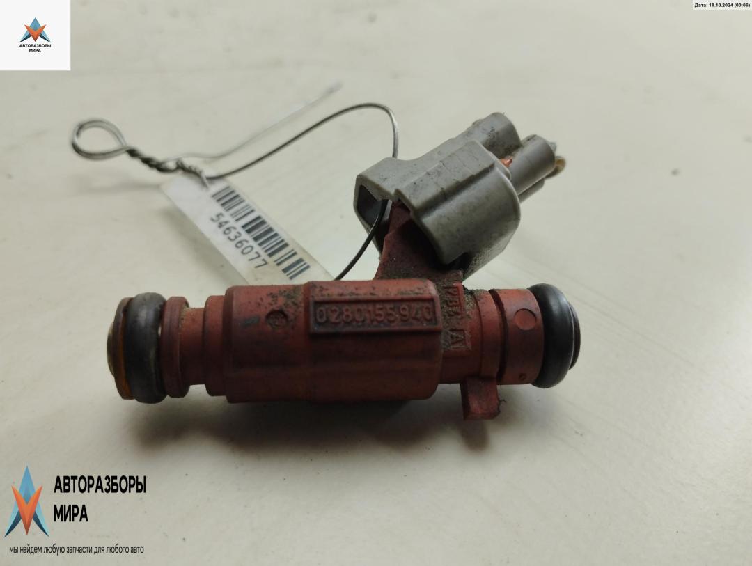 форсунка Nissan Primera P12 2002, 1.8 л., бензин, МКПП, зелёный, универсал, 16600-9F600 - фото №1