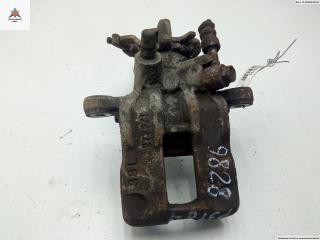 суппорт задний левый Nissan Almera N16 [рестайлинг] 2004, 1.5 л., бензин, МКПП, чёрный, хетчбэк 3 дв.