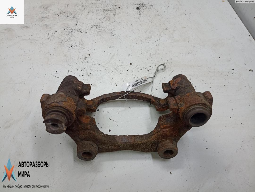 скоба суппорта Opel Astra G 1999, 1.6 л., бензин, АКПП, синий, хетчбэк 5 дв. - фото №1