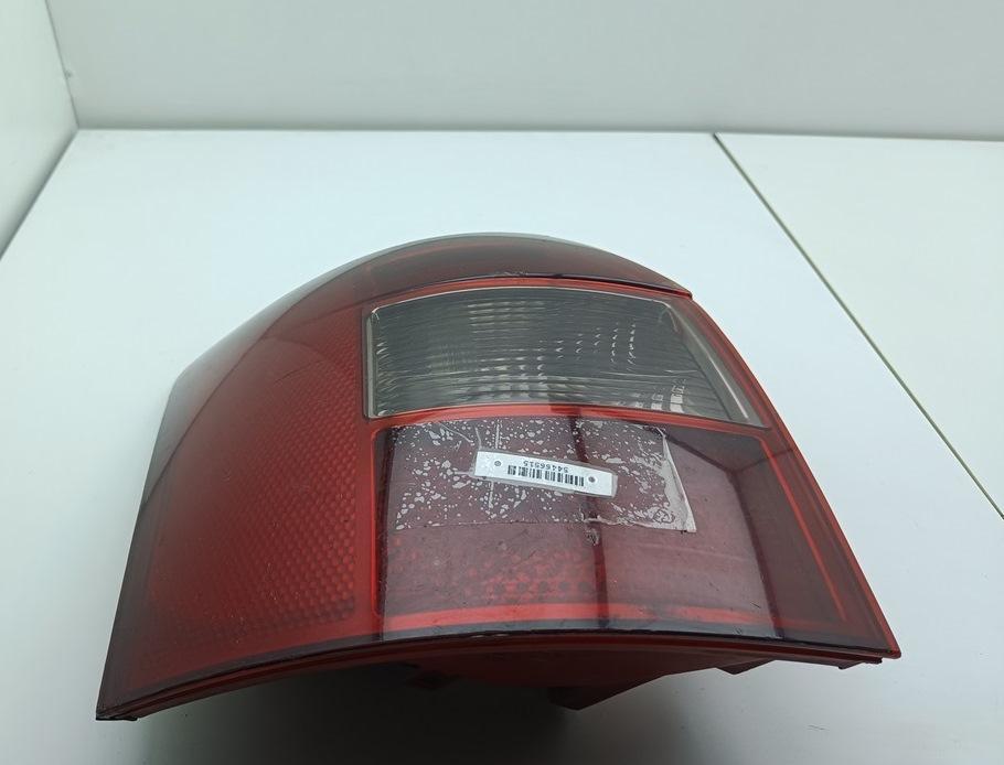 фонарь задний левый Audi A4 B6 2003, 2.5 л., дизель, АКПП, серый, универсал, 8E9945095 - фото №1