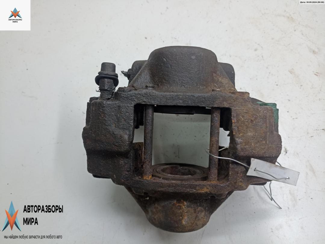 суппорт задний левый Opel Omega B 1995, 2.0 л., бензин, МКПП, зелёный, универсал - фото №1