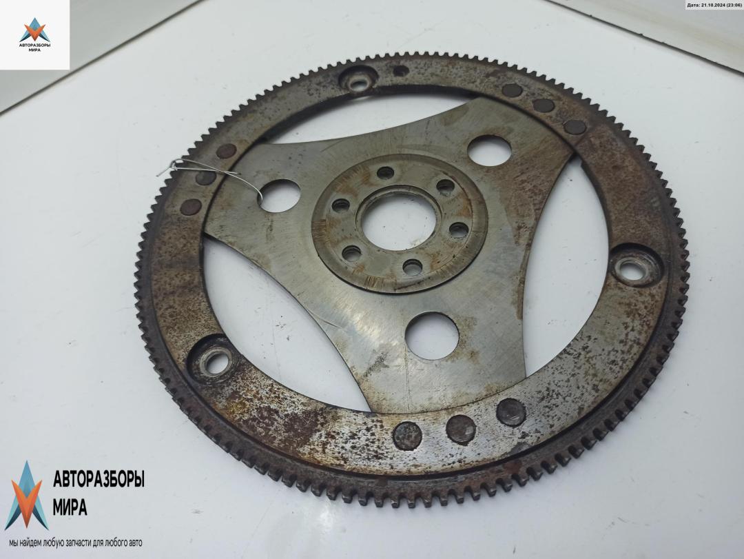 маховик Opel Astra G 1999, 1.6 л., бензин, АКПП, красный, хетчбэк 5 дв. - фото №1