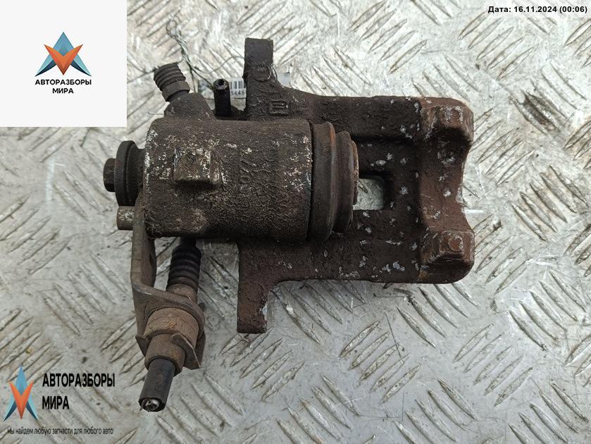 суппорт задний левый Volkswagen Golf 4 поколение 1999, 1.6 л., бензин, МКПП, синий, хетчбэк 5 дв. - фото №1