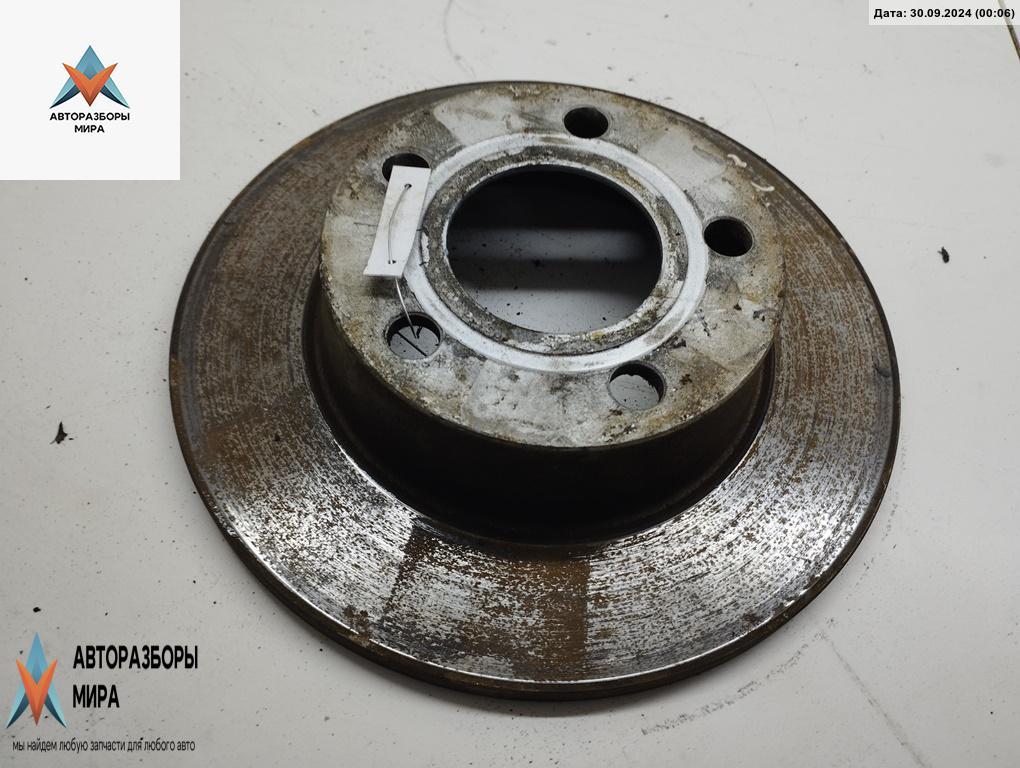 диск тормозной задний Audi A6 4B/C5 2000, 2.5 л., дизель, АКПП, чёрный, универсал - фото №1