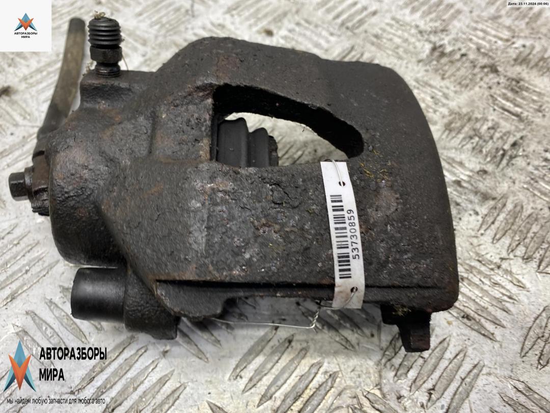 суппорт передний левый Audi A3 8L 1997, 1.9 л., дизель, МКПП, жёлтый, хетчбэк 3 дв. - фото №1