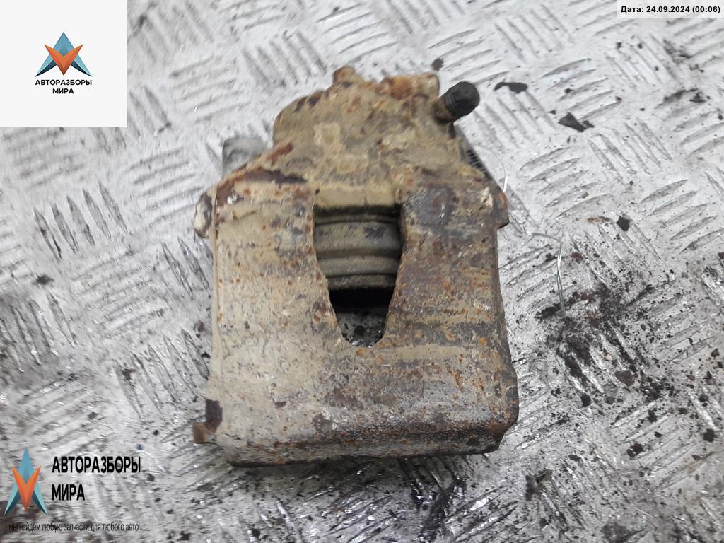 суппорт передний левый Volkswagen Golf 4 поколение 2003, 1.9 л., дизель, МКПП, синий, универсал - фото №1