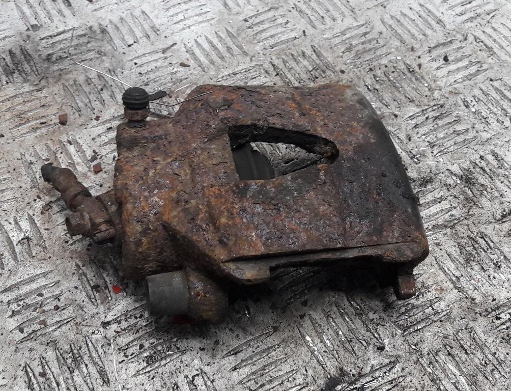 суппорт передний левый Volkswagen Bora 2002, 1.6 л., бензин, АКПП, серый, универсал, 1K0615123D