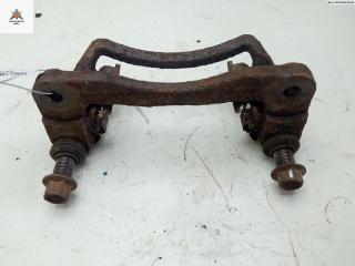 скоба суппорта Mitsubishi Galant 8 поколение [рестайлинг] 1999, 2.5 л., бензин, МКПП, чёрный, универсал