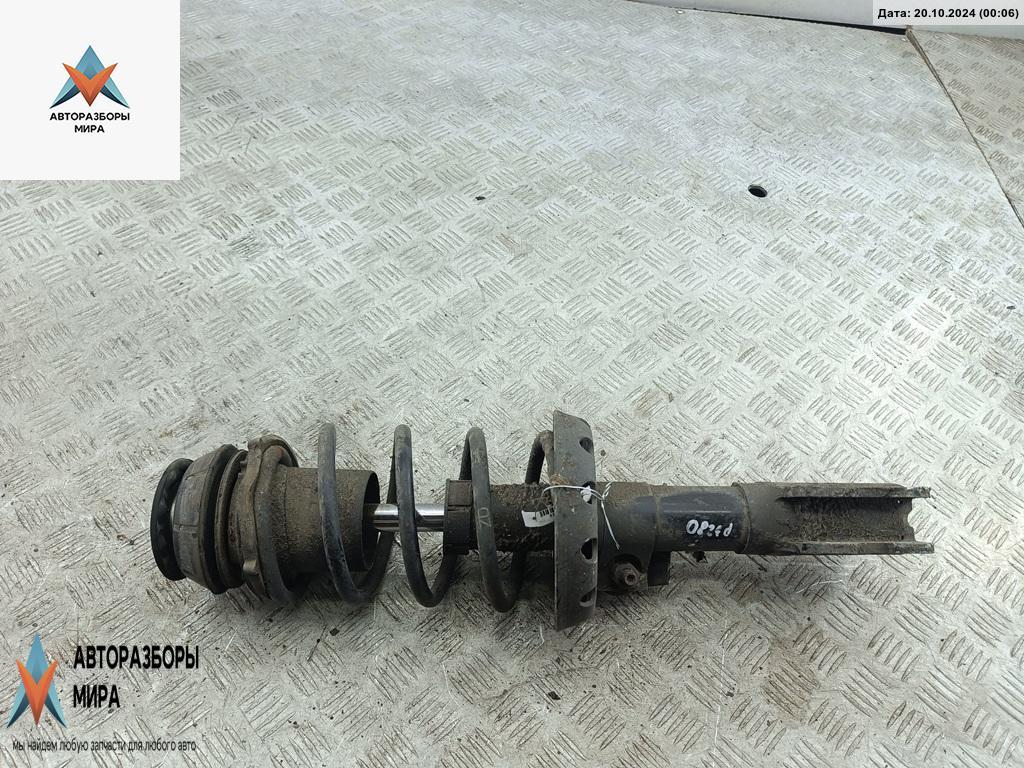 стойка передняя Opel Astra G 1998, 1.6 л., бензин, МКПП, серый, хетчбэк 5 дв. - фото №1