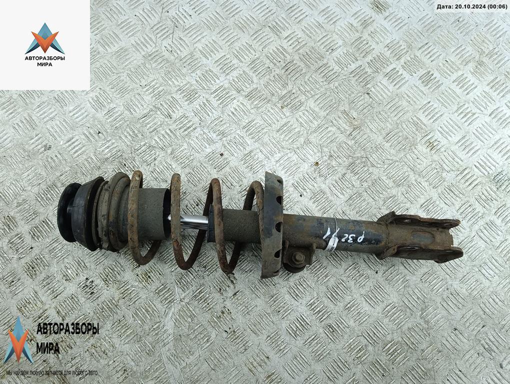 стойка передняя Opel Astra G 2001, 1.2 л., бензин, МКПП, синий, хетчбэк 5 дв. - фото №1