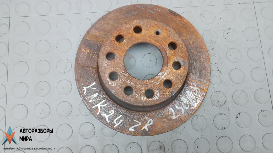 диск тормозной задний Skoda Octavia 3 поколение (A7) 2014, 1.6 л., дизель, МКПП, хетчбэк 5 дв., 5Q0615601F, 1K0615601AB - фото №1