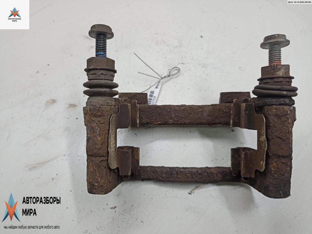 скоба суппорта Opel Zafira 1 поколение (A) 2002, 1.8 л., бензин, МКПП, серый, минивэн - фото №1