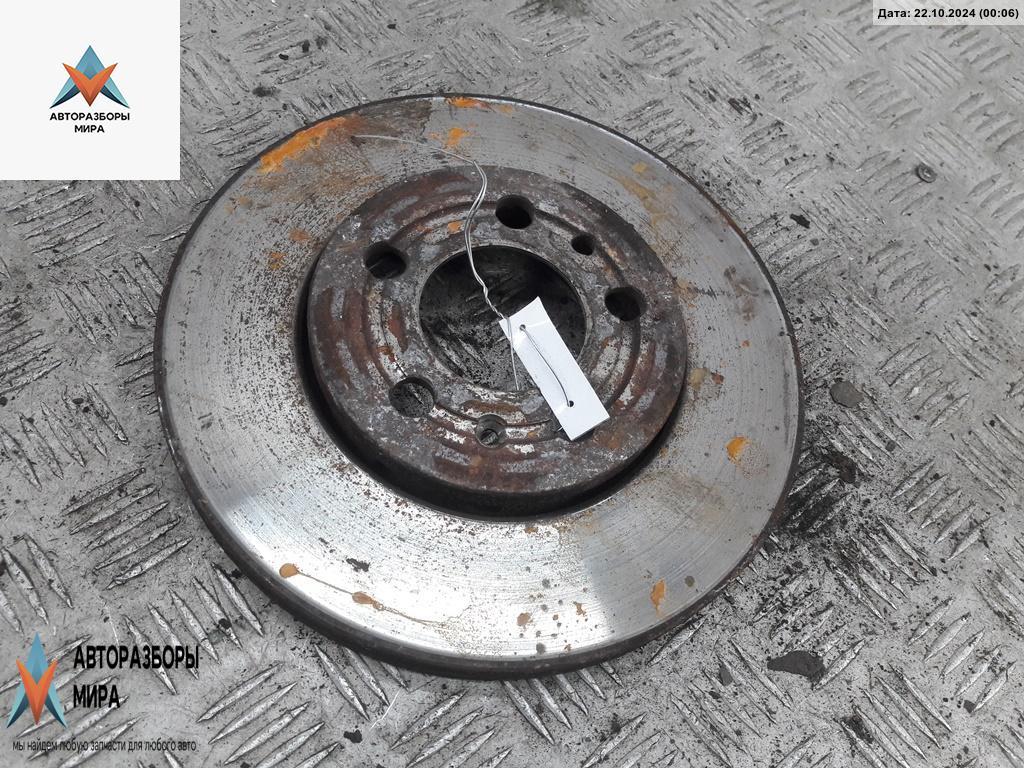 диск тормозной передний Volkswagen Bora 1 поколение 1998, 1.6 л., бензин, МКПП, зелёный, седан - фото №1