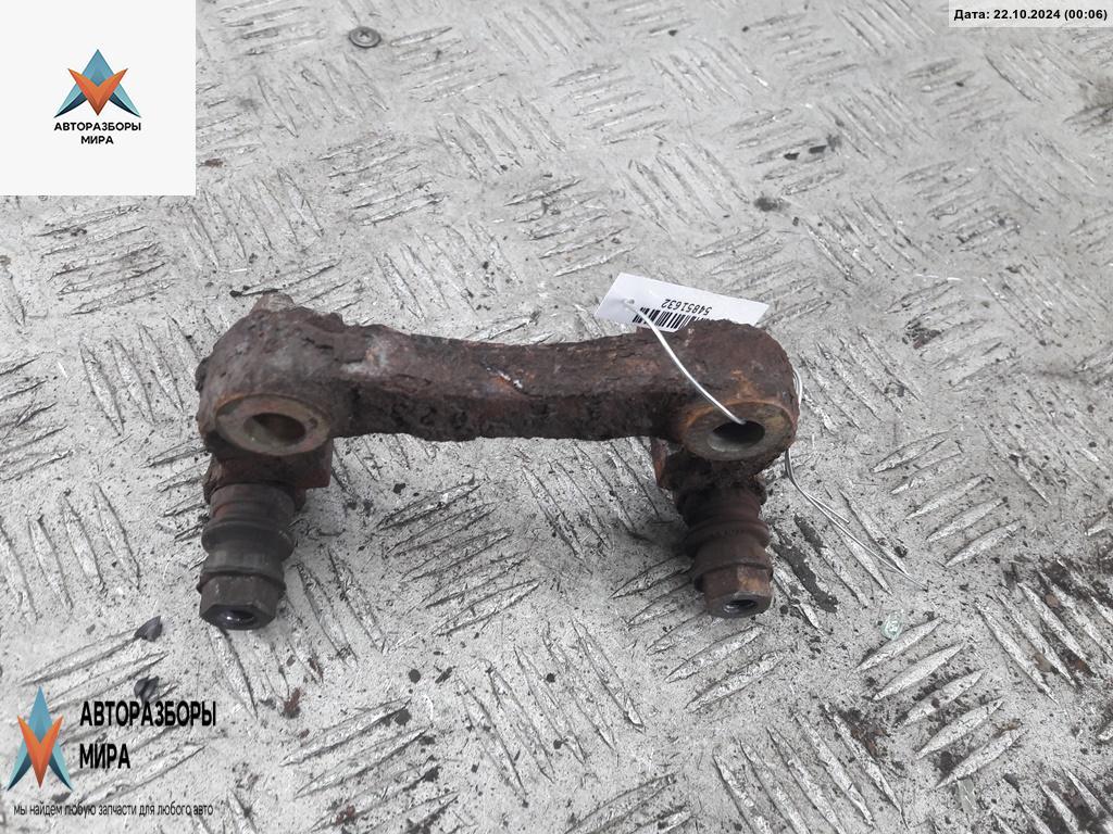 скоба суппорта Volkswagen Golf 4 поколение 1999, 1.4 л., бензин, МКПП, белый, хетчбэк 5 дв. - фото №1