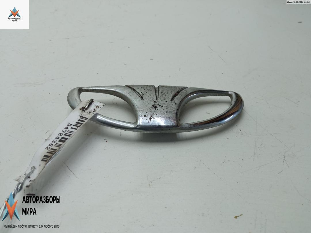 эмблема Daewoo Lanos T100 1998, 1.6 л., бензин, МКПП, чёрный, хетчбэк 3 дв. - фото №1