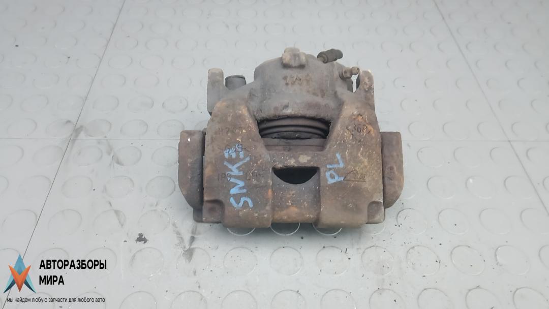 суппорт передний левый Renault Laguna 3 поколение 2008, 2.0 л., дизель, МКПП, универсал - фото №1