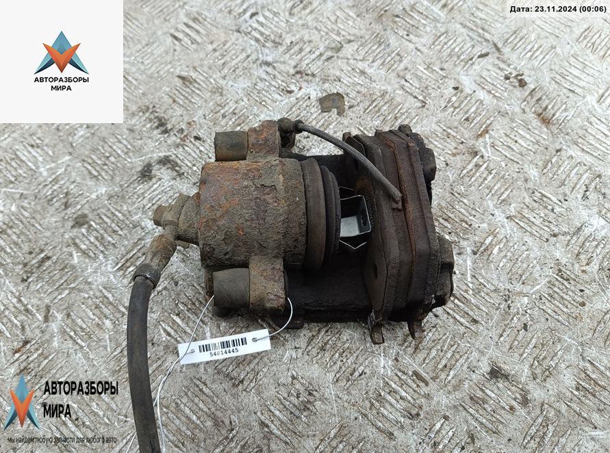 суппорт передний левый Volkswagen Golf 4 поколение 1999, 1.4 л., бензин, МКПП, синий, универсал - фото №1