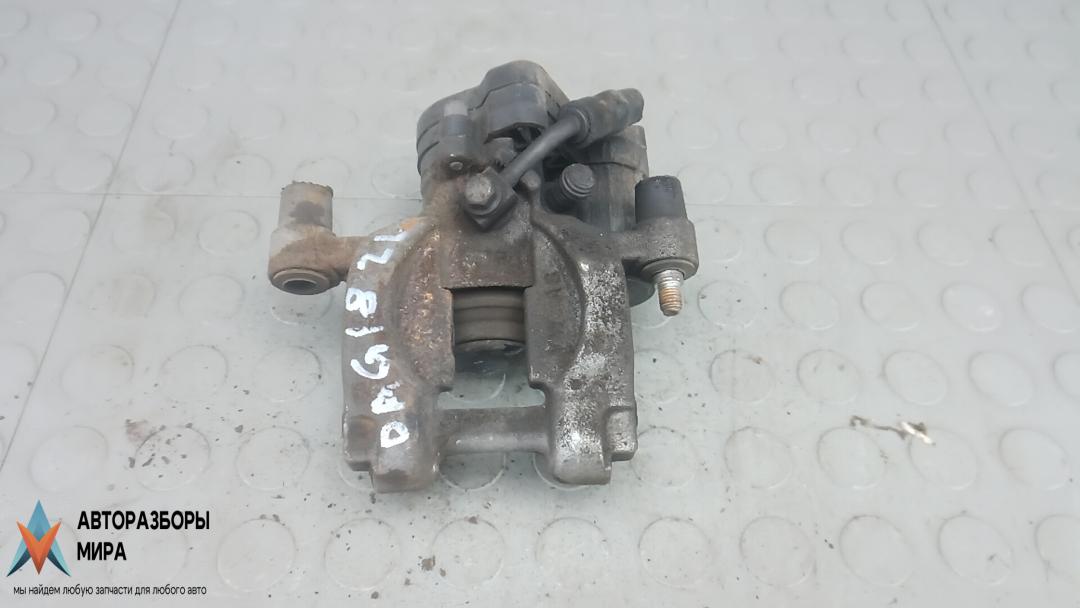 суппорт задний левый Skoda Superb 3 поколение 2018, 1.4 л., бензин, МКПП, универсал, 3Q0615423 - фото №1