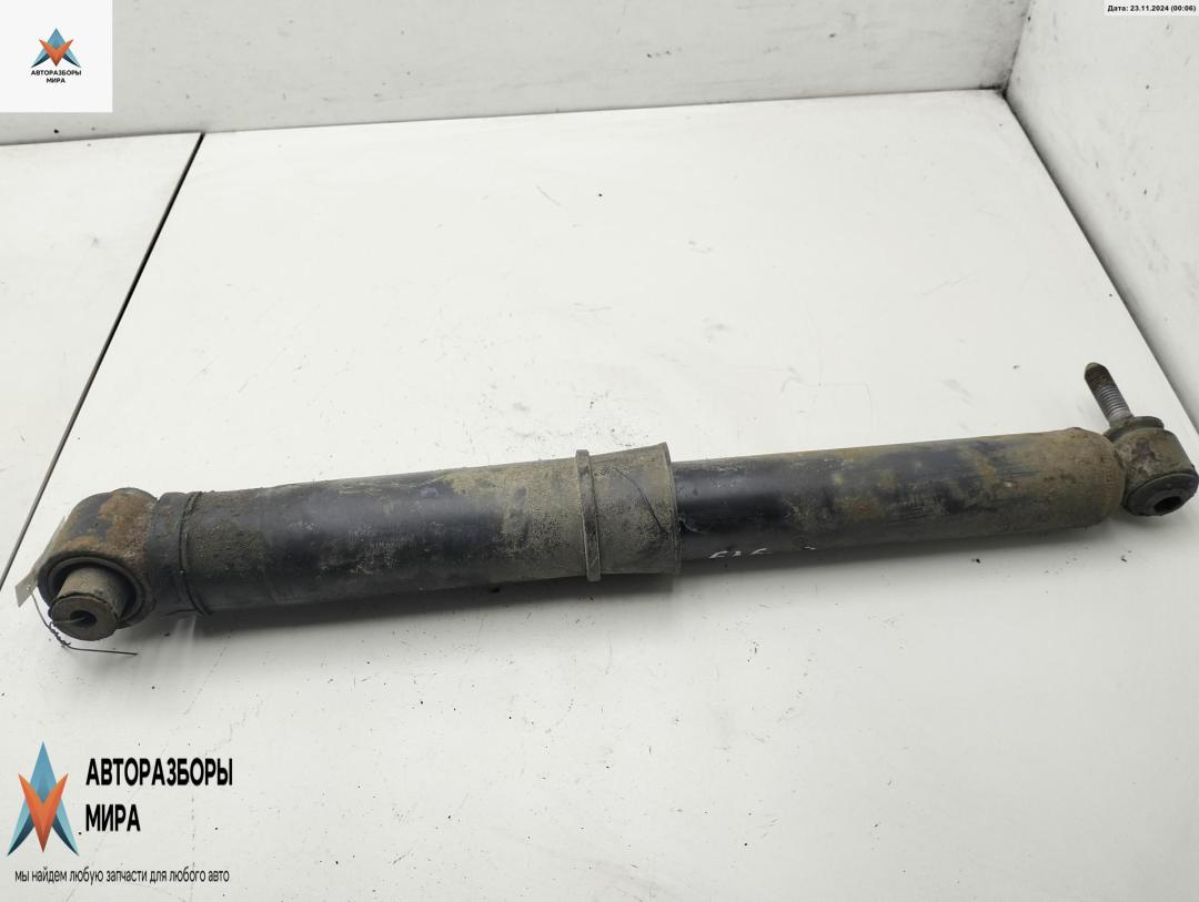 амортизатор задний правый Renault Megane 2 поколение 2003, 1.4 л., бензин, МКПП, красный, хетчбэк 5 дв. - фото №1