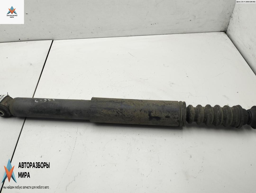 амортизатор задний правый Renault Clio 3 поколение 2008, 1.2 л., бензин, МКПП, серый, универсал - фото №1