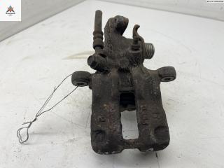 суппорт задний правый Nissan Almera N16 2001, 1.5 л., бензин, МКПП, серый, хетчбэк 3 дв.