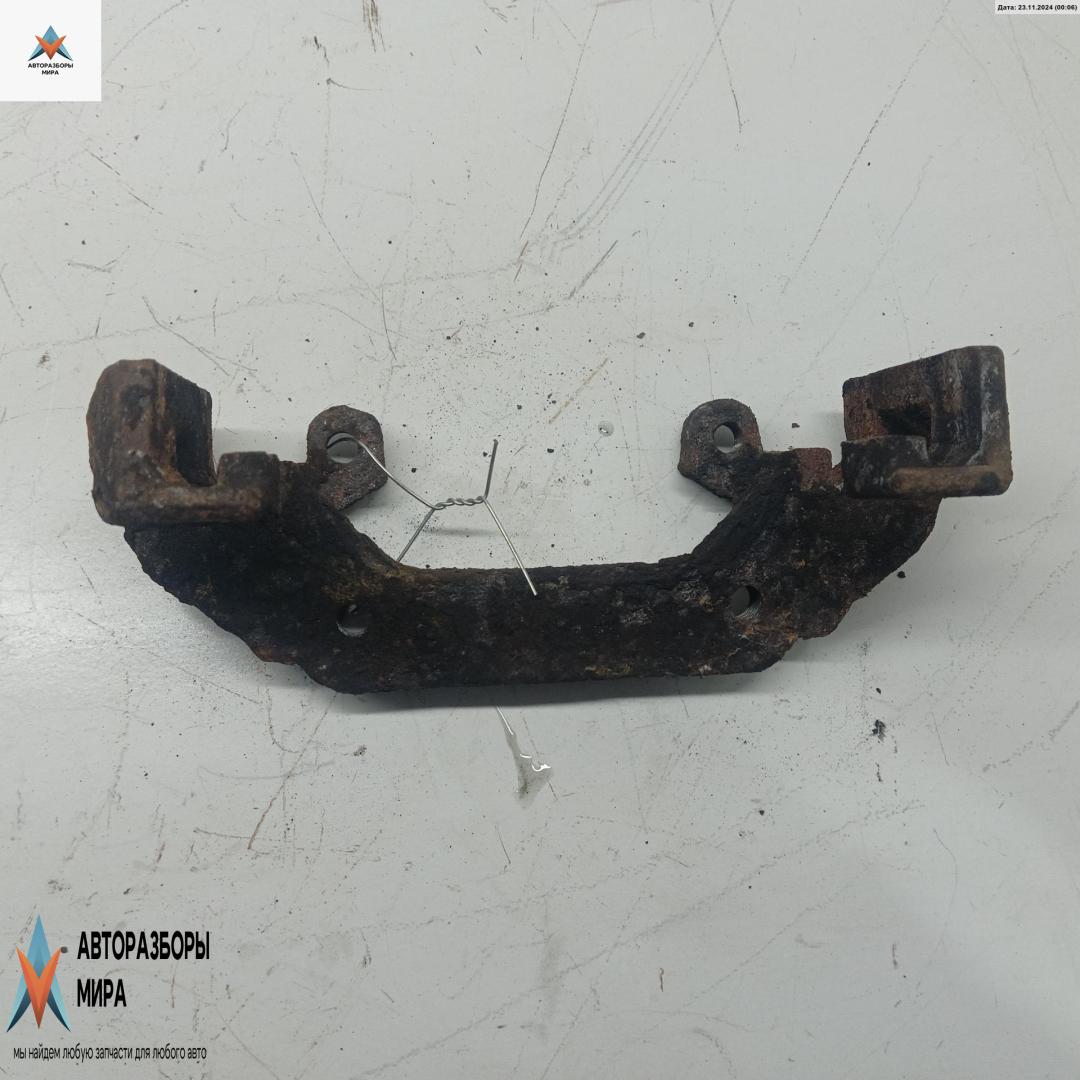 скоба суппорта Ford Fiesta 5 поколение 2003, 1.3 л., бензин, МКПП, серый, хетчбэк 3 дв., FORD - фото №1