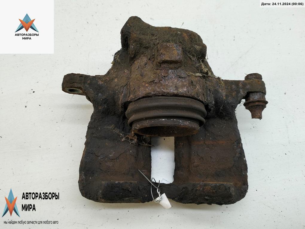 суппорт передний левый Volkswagen Caddy 2 поколение 1999, 1.9 л., дизель, МКПП, красный, фургон - фото №1