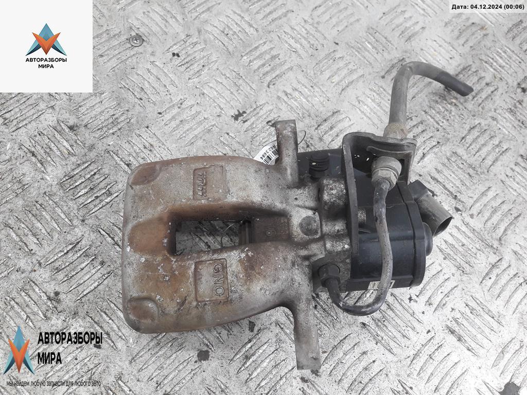 суппорт задний правый Volkswagen Passat B6 2006, 2.0 л., бензин, МКПП, серый, универсал - фото №1