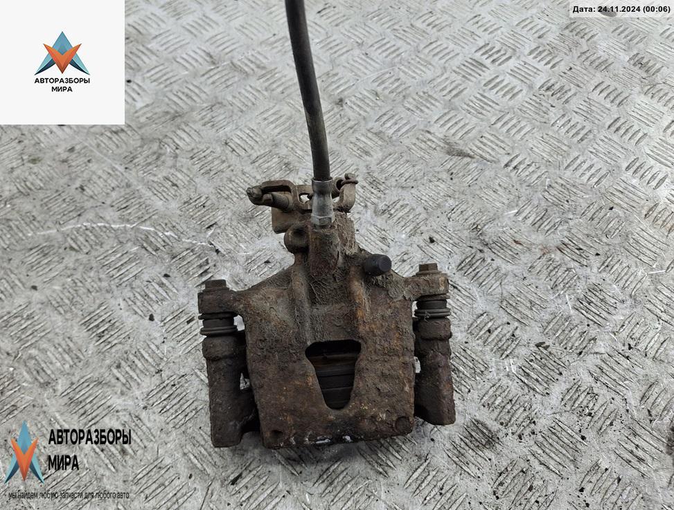 суппорт задний правый Ford Mondeo 3 поколение 2001, 2.0 л., бензин, МКПП, серый, хетчбэк 5 дв. - фото №1