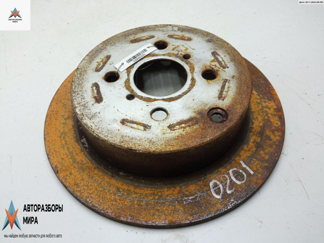 диск тормозной задний Toyota Yaris XP9 2005, 1.4 л., дизель, МКПП, синий, хетчбэк 5 дв. - фото №1