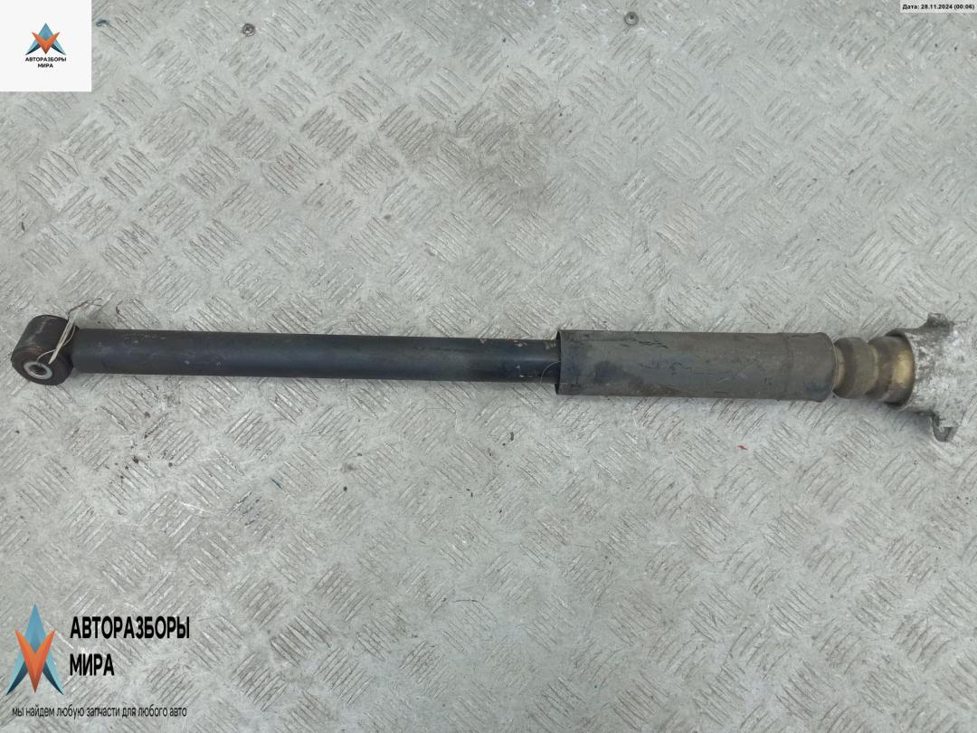 амортизатор задний правый Mazda 2 DE 2008, 1.3 л., бензин, МКПП, белый, хетчбэк 5 дв. - фото №1