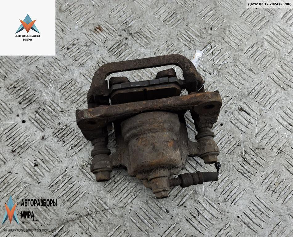 суппорт задний правый Renault Koleos 1 поколение 2008, 2.0 л., дизель, МКПП, серый, внедорожник 5 дв. - фото №1