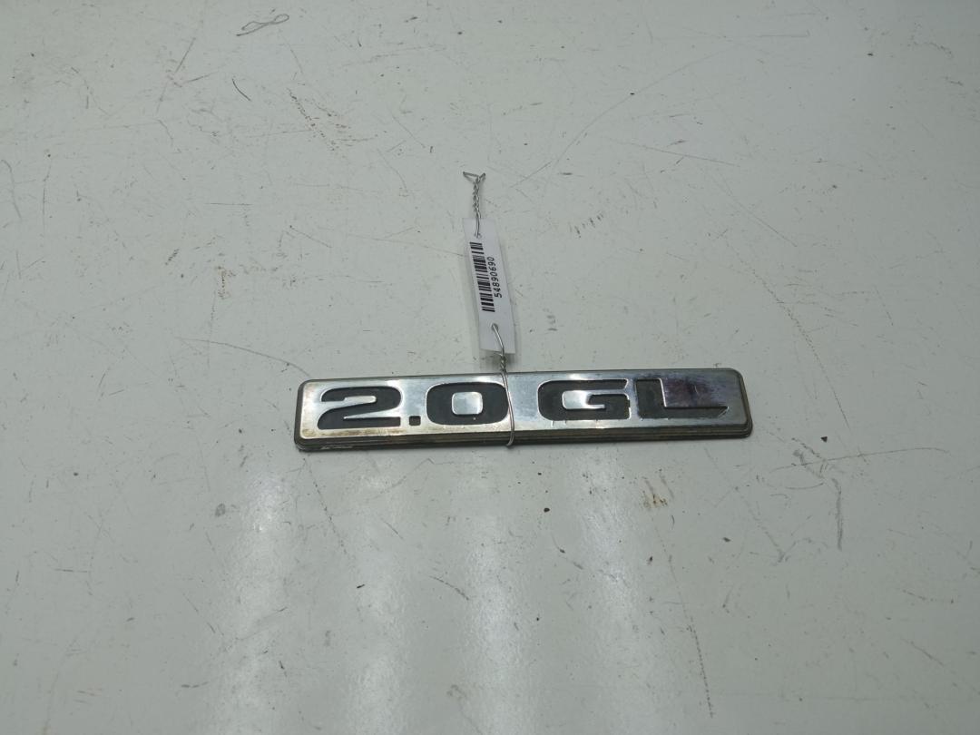 эмблема Subaru Legacy 3 поколение 2001, 2.0 л., бензин, МКПП, зелёный, универсал - фото №1