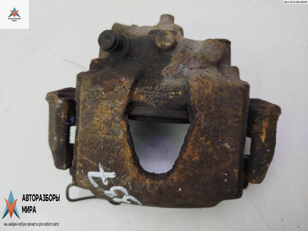 суппорт передний правый Opel Astra F 1993, 1.6 л., бензин, МКПП, синий, хетчбэк 5 дв. - фото №1