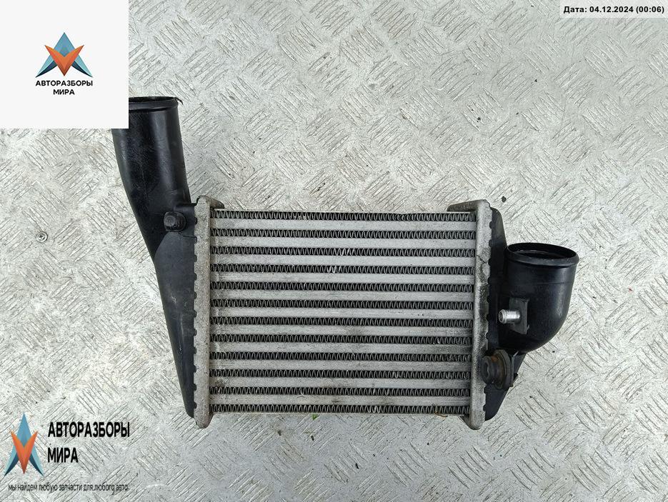 радиатор интеркулера Audi A6 4B/C5 2000, 2.7 л., бензин, АКПП, зелёный, универсал, 078145806F - фото №1
