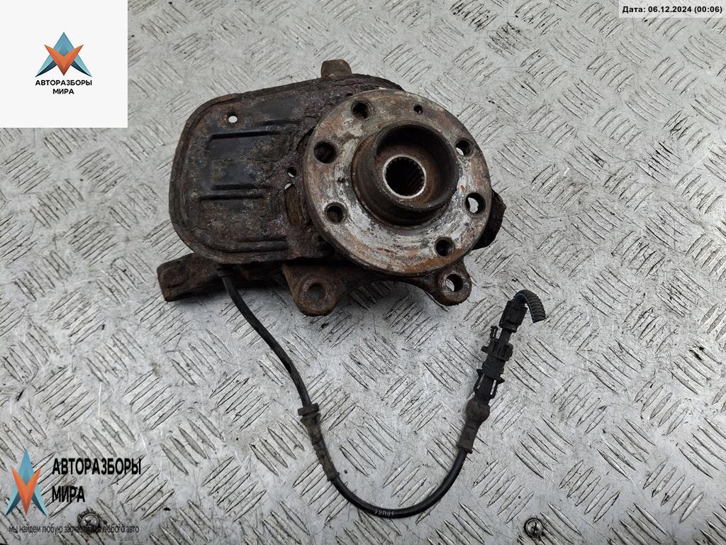 ступица передняя левая Opel Combo 3 поколение (C) 2002, 1.6 л., бензин, МКПП, серый, фургон - фото №1