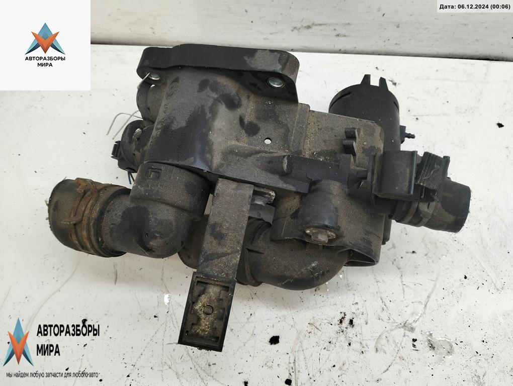 корпус термостата Skoda Fabia 1 поколение (6Y) 2003, 1.4 л., бензин, МКПП, серый, универсал, 032121111AP - фото №1