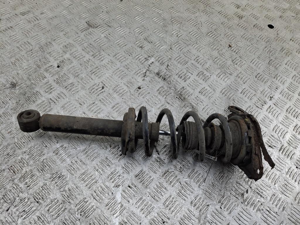 стойка передняя Nissan Almera Tino V10 2001, 1.8 л., бензин, МКПП, серый, минивэн - фото №1
