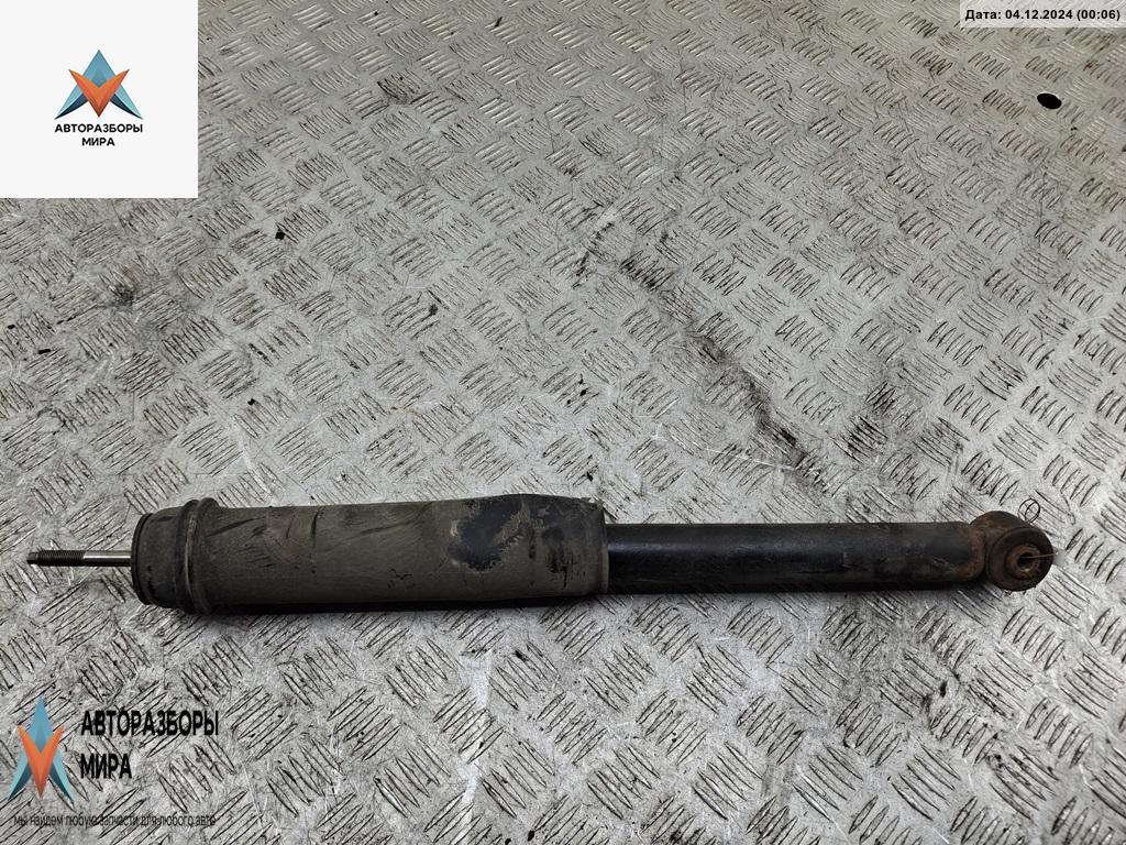 амортизатор задний левый Mitsubishi Grandis 1 поколение 2004, 2.4 л., бензин, МКПП, чёрный, минивэн, 4162A040 - фото №1