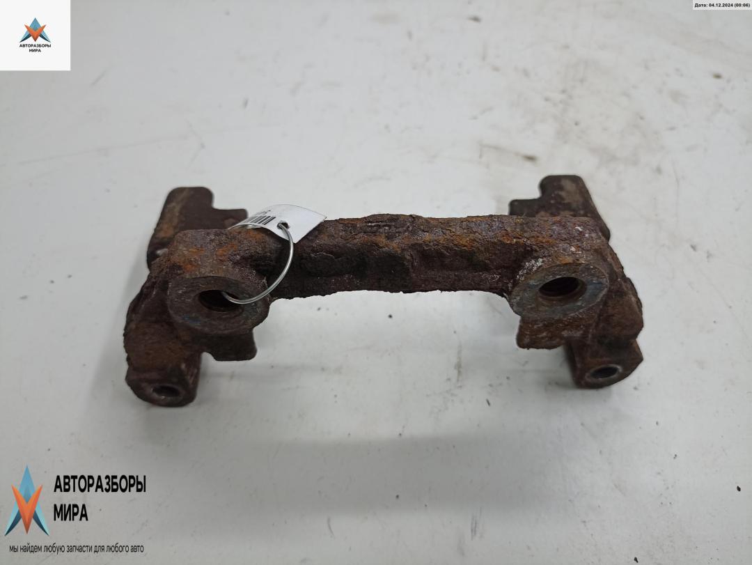 скоба суппорта Opel Vectra C 2003, 2.2 л., бензин, МКПП, серый, седан - фото №1